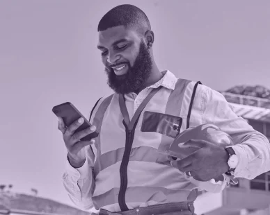 black-man-online-architect-with-phone-construction-site-building-update-social-media-networking-smile-news-happy-african-engineer-texting-chat-digital-mobile-app-internet
