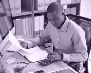 high-angle-view-male-accountant-checking-financial-document