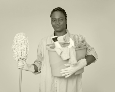 portrait-black-woman-housekeeper-holding-basket-with-cleaning-tools