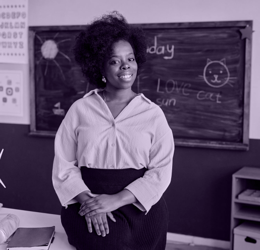 portrait-smiling-primary-school-teacher-classroom