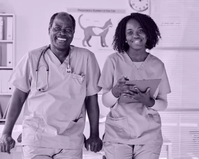 portrait-vet-doctor-with-nurse-uniform-smiling-camera-while-working-together-vet-clinic
