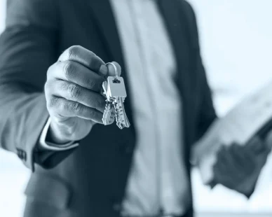 real-estate-agent-handing-house-key