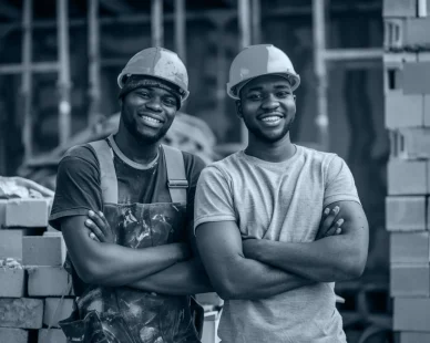 two-men-wearing-yellow-hard-hats-one-wearing-yellow